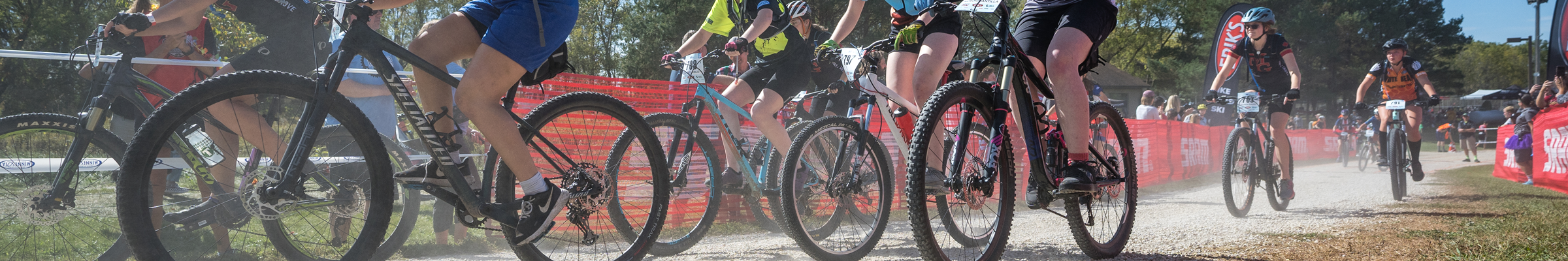 Mountain bike tires on gravel road at Gamehaven Scout Camp